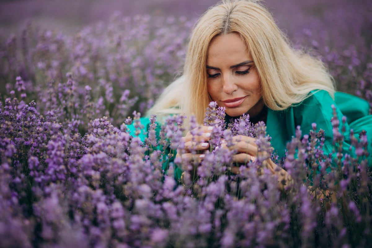 Woman walking through a lavender field