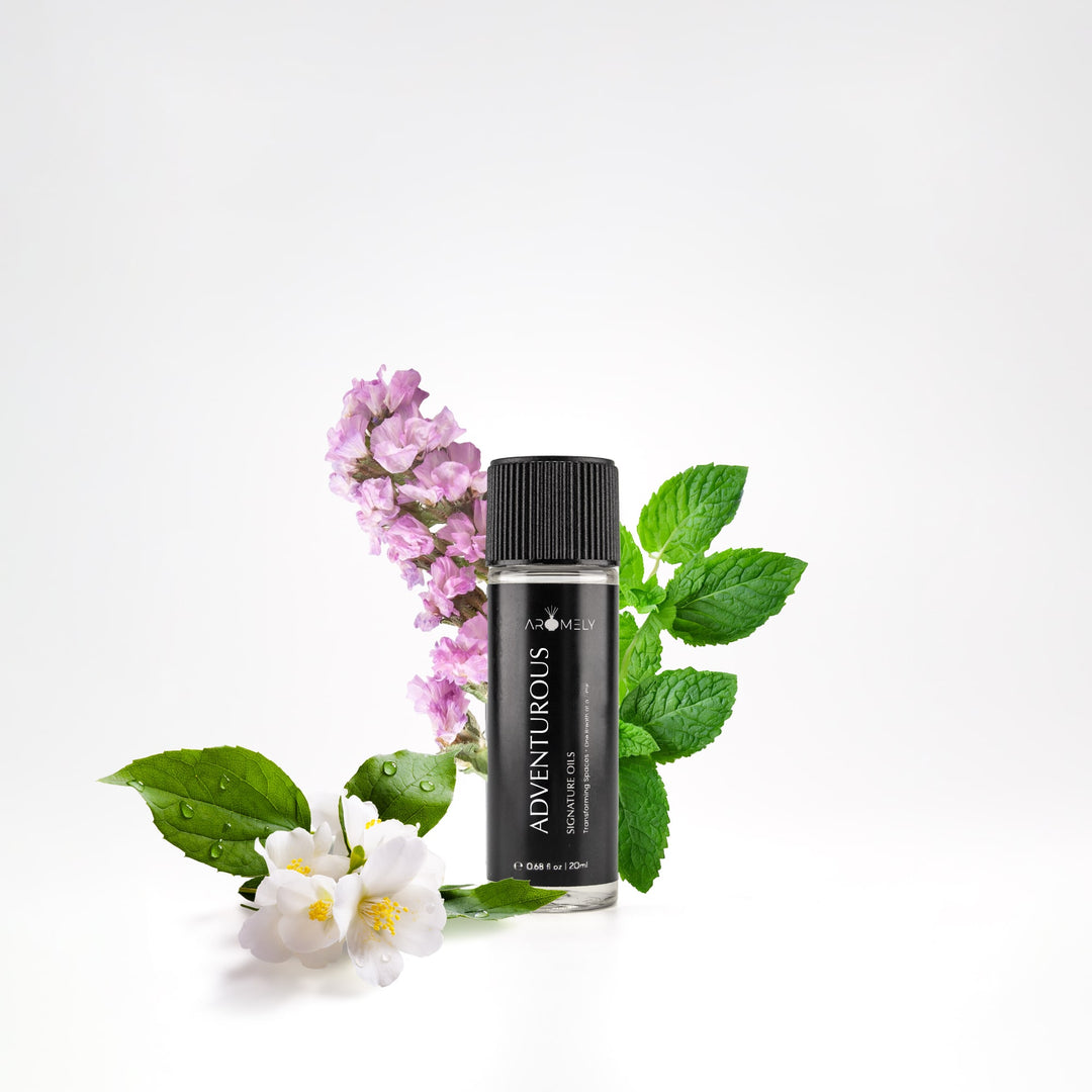 Aromely Adventurous essential oil blend, 20ml bottle, with mint leaves, jasmine flowers, and lilac blossoms. A fresh, floral, and invigorating scent that brings a bold and confident atmosphere—like stepping into a high-end resort.