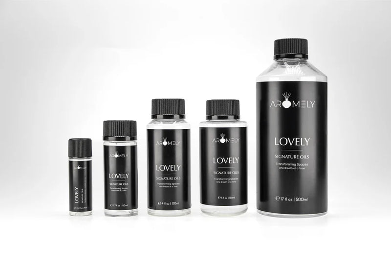 Aromely Lovely diffuser oil  bottle sizes with grapefruit, pine, white blossoms and amber
