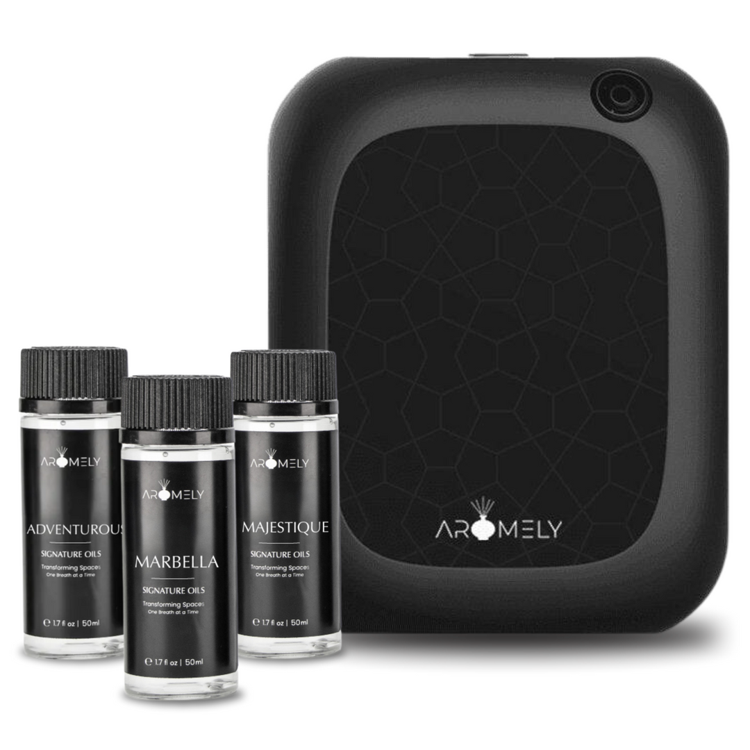 Aromely Scent Diffuser used for large spaces, ensuring even and continuous fragrance diffusion with advanced nebulizing technology. The modern black design is compact and versatile, making it suitable for home or office use. Comes with three 50ml signature essential oils: Adventurous, a luxurious and elegant scent, Marbella, a bold and invigorating aroma, and Majestique, a crisp and refreshing fragrance.