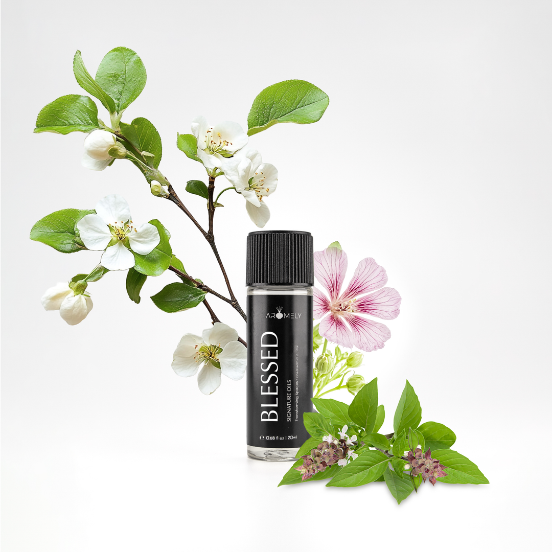 Aromely Blessed essential oil blend, 20ml bottle, with white apple blossoms, soft pink florals, and fresh herbal notes. A delicate, clean, and calming scent that makes your home feel as serene as a spa resort.