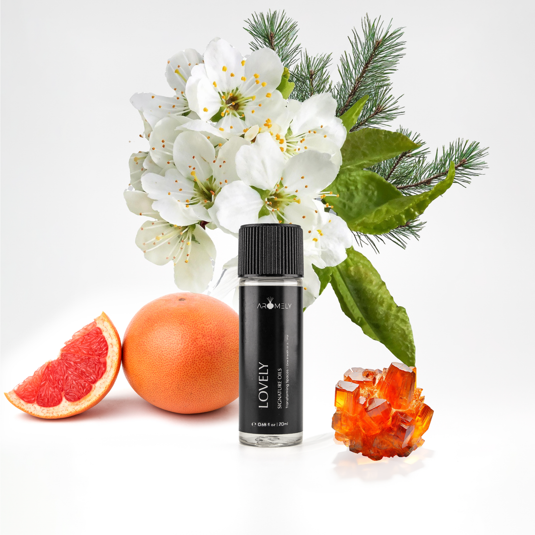 Aromely Lovely essential oil blend, 20ml bottle, blended with grapefruit, pine, white blossoms, and amber crystals. A fresh, floral, and slightly woody aroma that fills your space with the charm and serenity of a world-class resort.