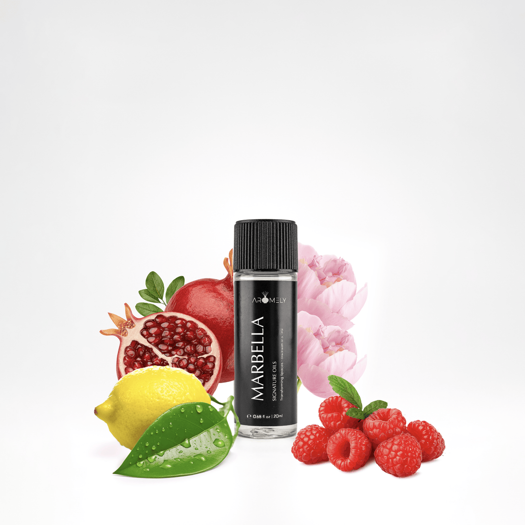 Aromely Marbella essential oil blend, 20ml bottle, infused with vibrant pomegranate, lemon, raspberries, and pink florals. A fruity, feminine scent that captures Mediterranean luxury, bringing resort-like indulgence into your home.