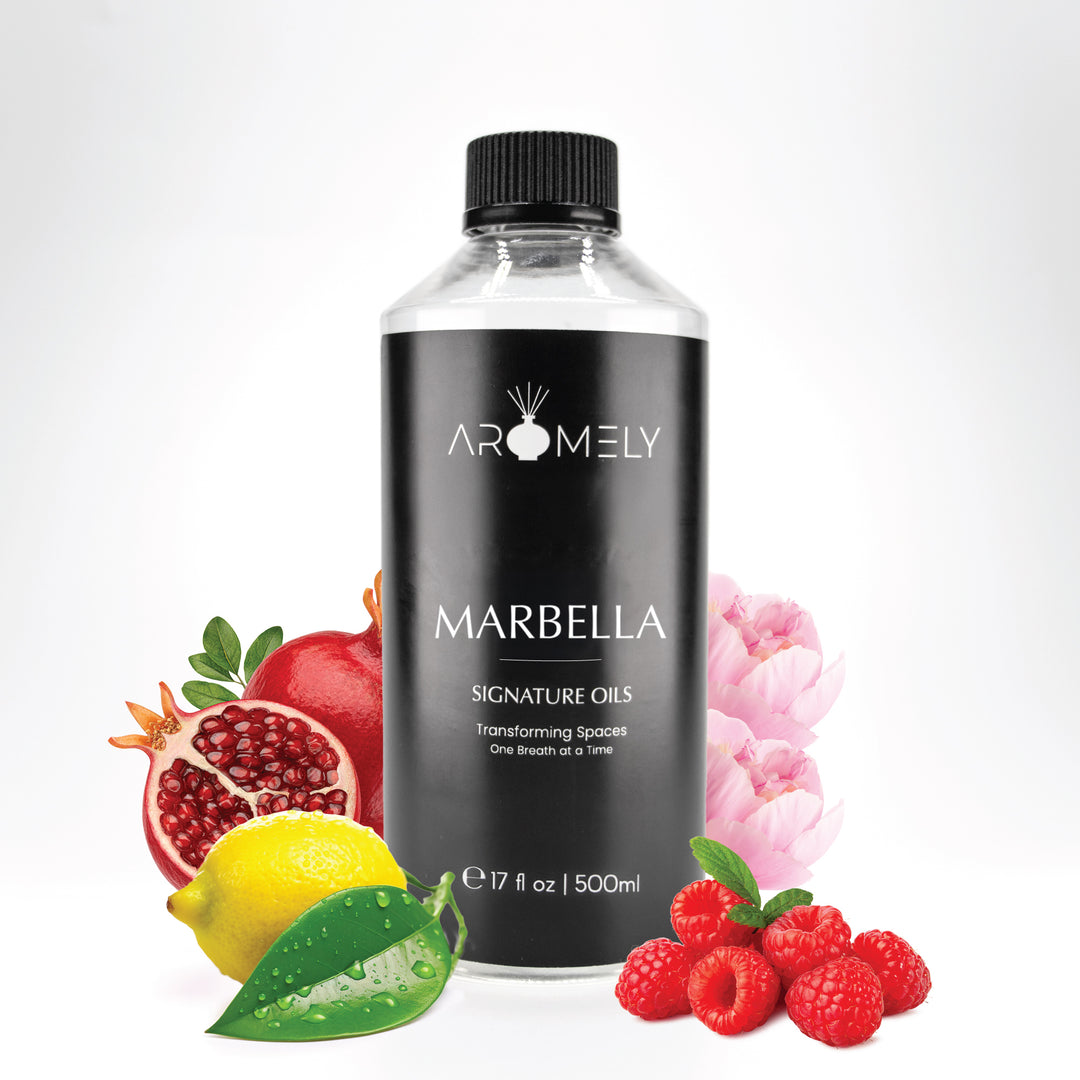 Aromely Marbella diffuser oil, 500ml bottle, infused with vibrant pomegranate, lemon, raspberries, and pink florals. A fruity, feminine scent that captures Mediterranean luxury, bringing resort-like indulgence into your home.