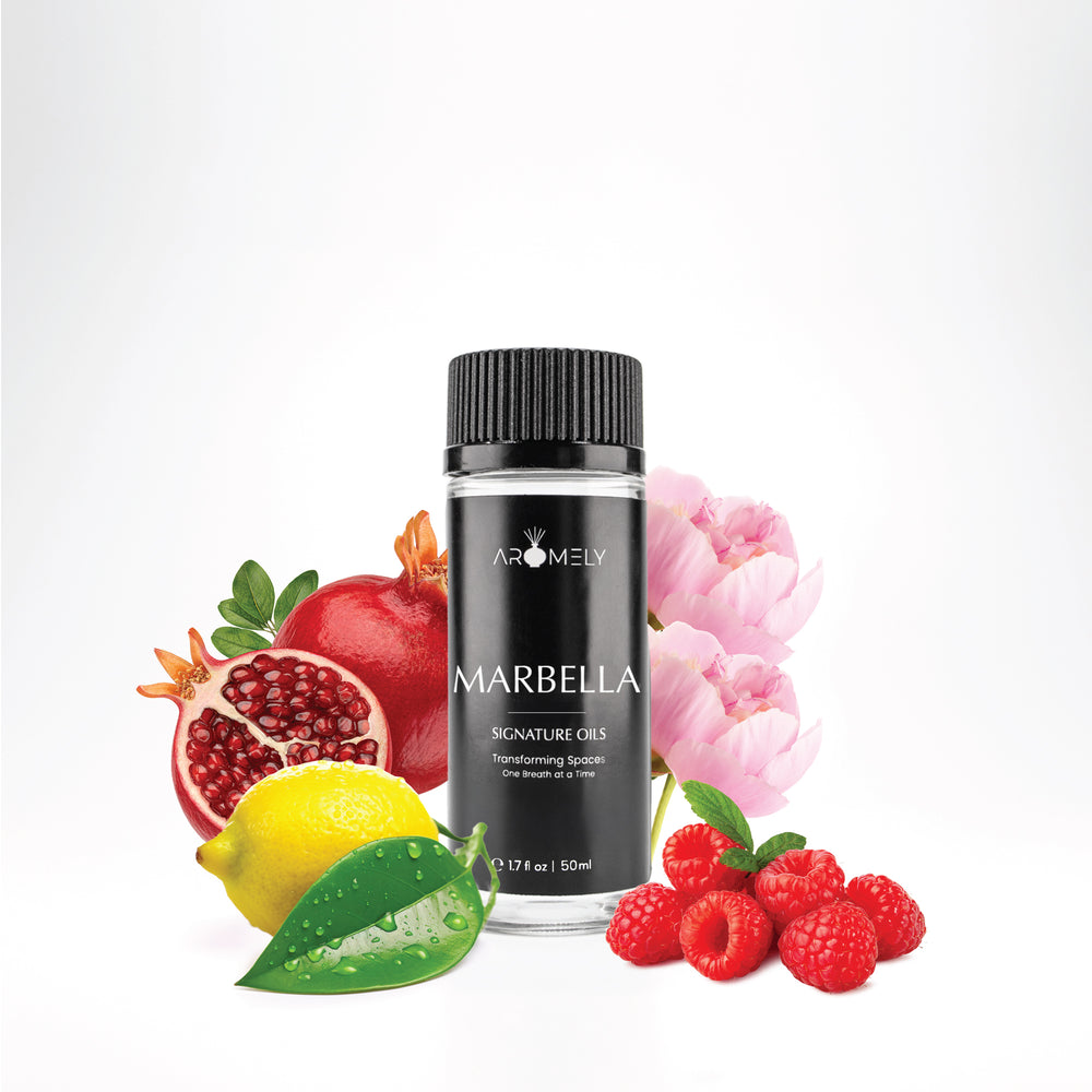 Aromely Marbella diffuser oil, 50ml, infused with vibrant pomegranate, lemon, raspberries, and pink florals. A fruity, feminine scent capturing Mediterranean luxury.