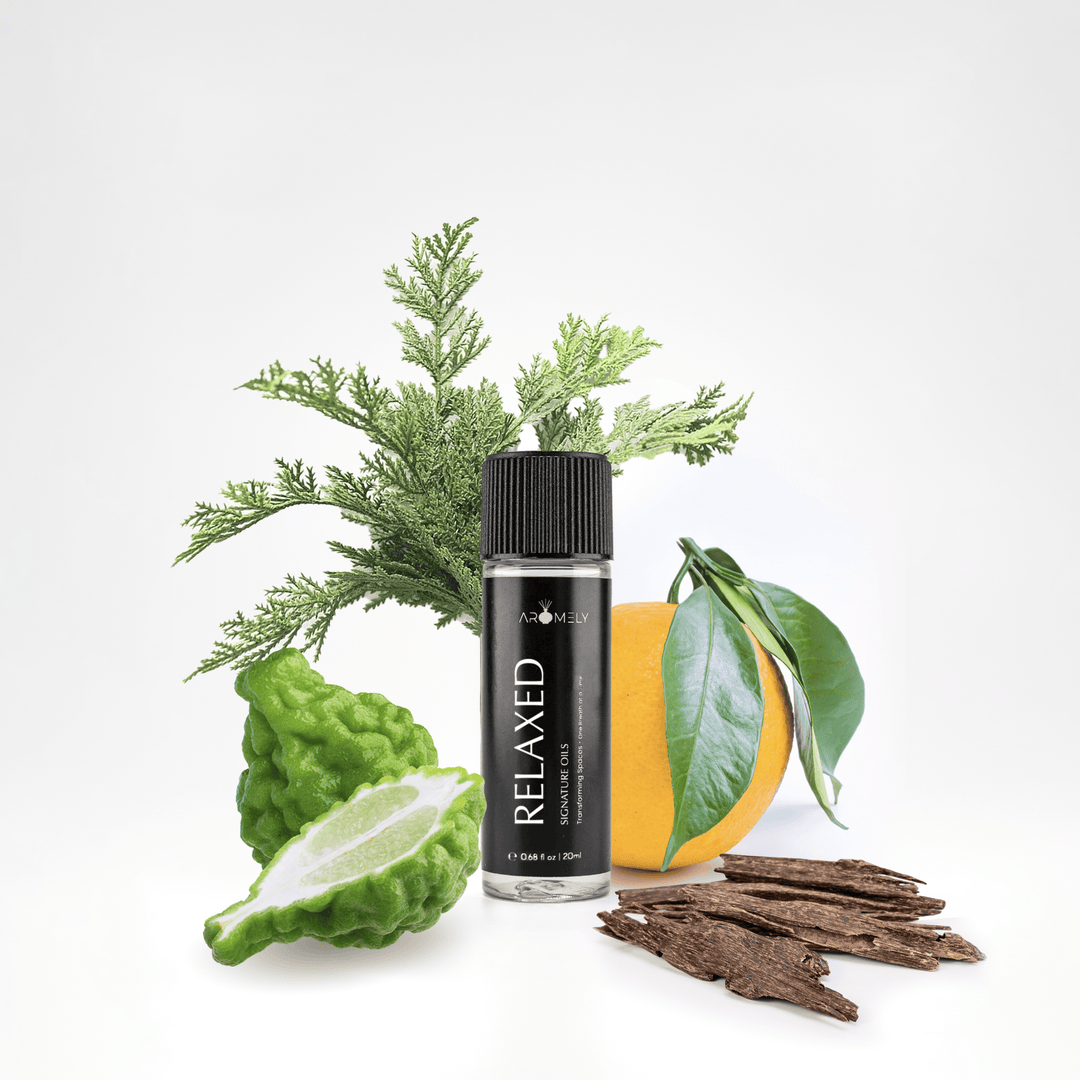 Aromely Relaxed essential oil blend, 20ml bottle, blended with bergamot, orange, oud wood, and cypress. A soothing citrus-wood aroma designed for stress relief and relaxation—bringing the essence of a luxury spa into your home.