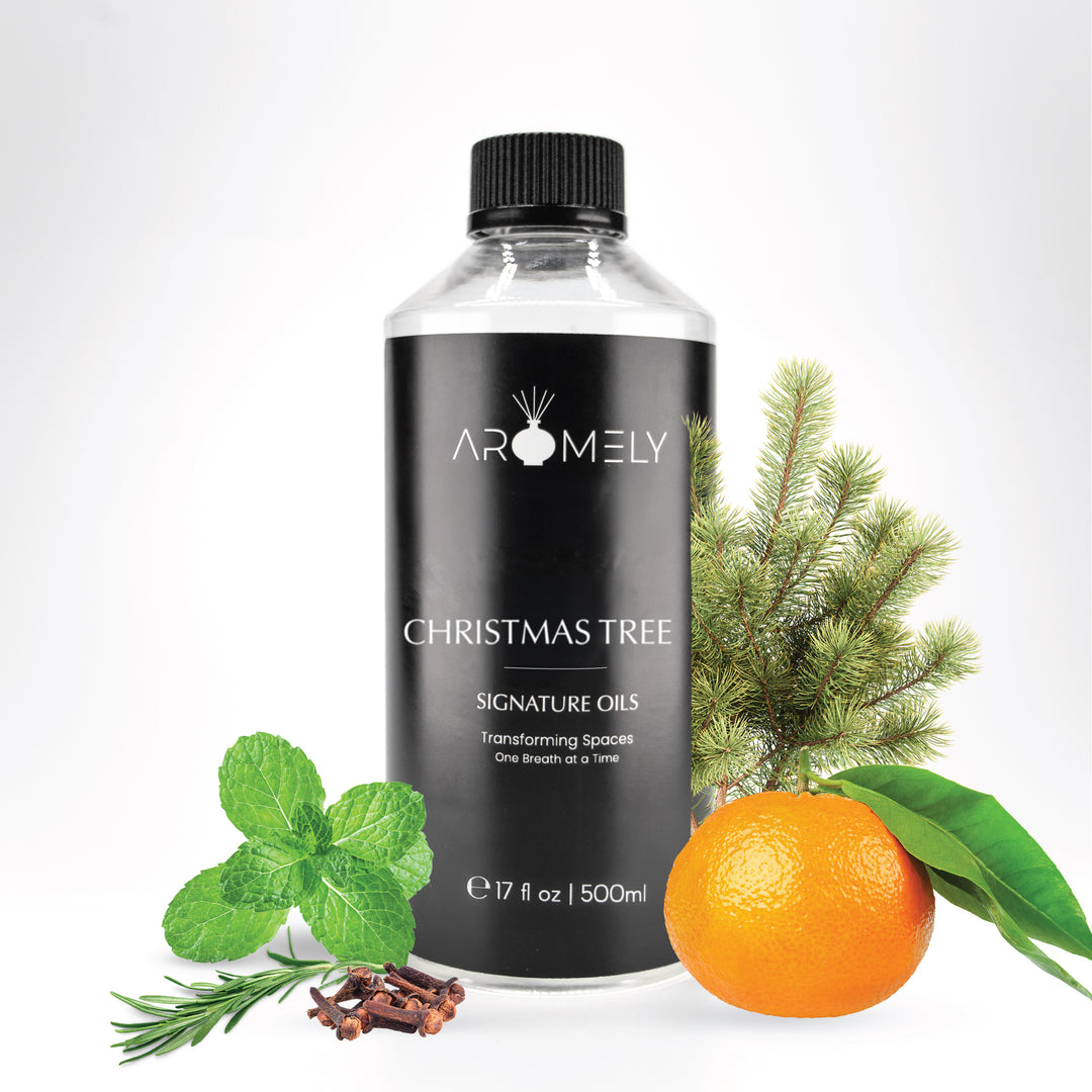 A 500ml bottle of Aromely Christmas Tree fragrance oil, evoking the fresh, festive scent of pine, mint, and citrus.