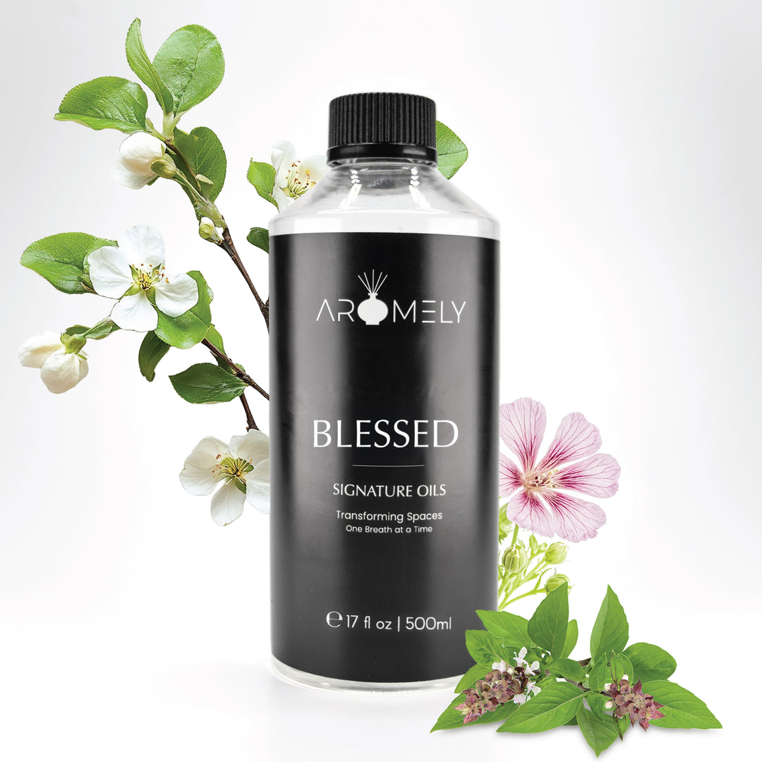 Aromely Blessed diffuser oil, 500ml bottle, with white apple blossoms, soft pink florals, and fresh herbal notes. A delicate, clean, and calming scent that makes your home feel as serene as a spa resort.