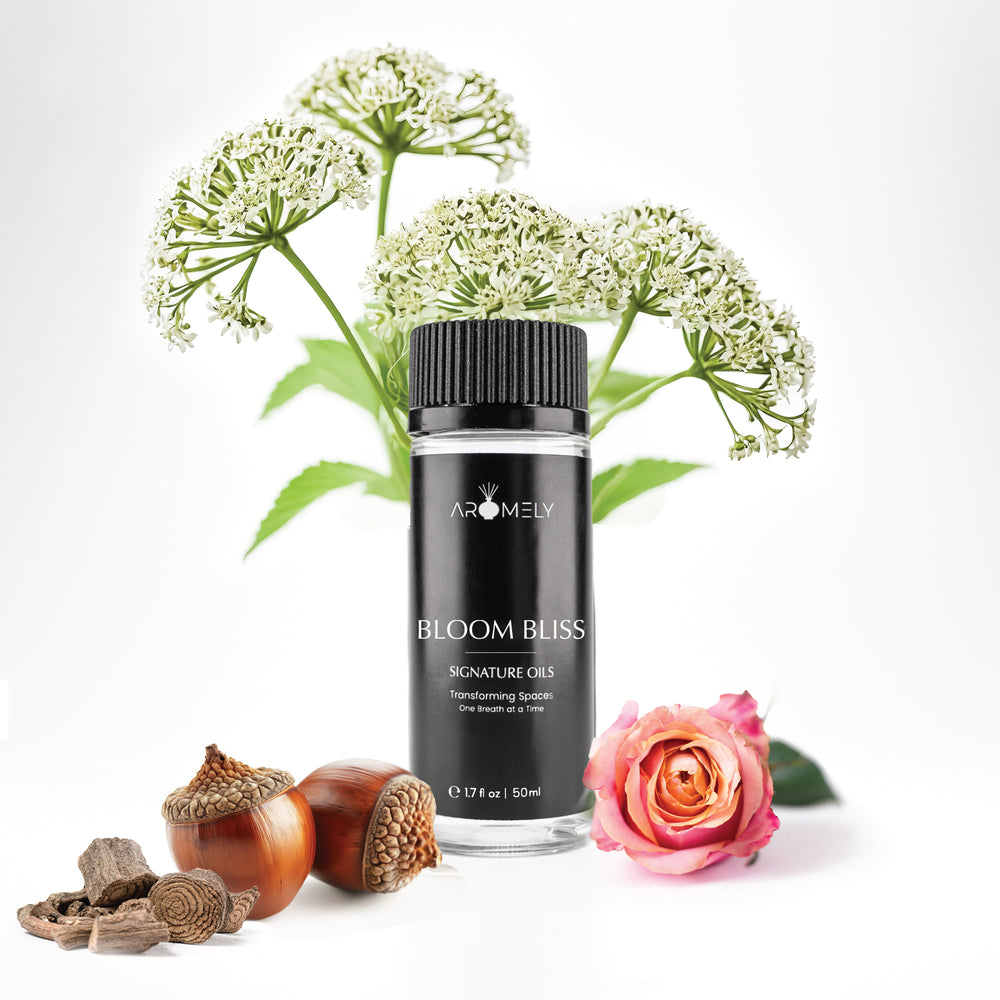 Aromely Bloom Bliss diffuser oil, 50ml, showcasing white wildflowers, acorns, sandalwood, and soft rose petals. A warm, woody floral aroma for a cozy, inviting space.