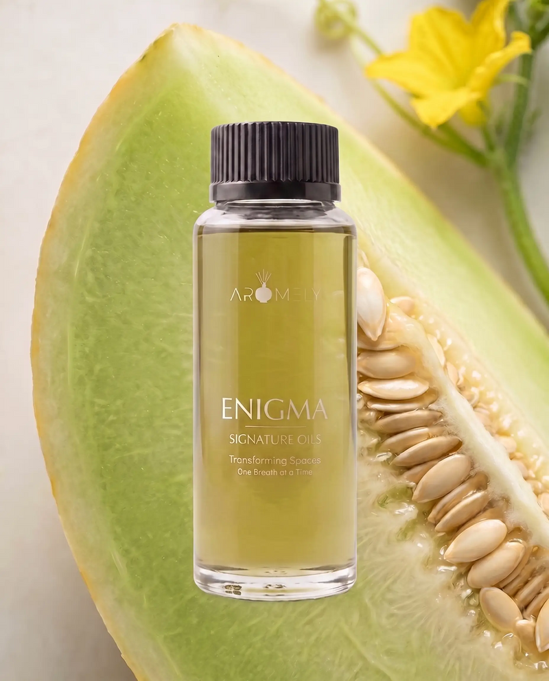 Aromely Enigma fragrance oil bottle, 120 ml, against green melon