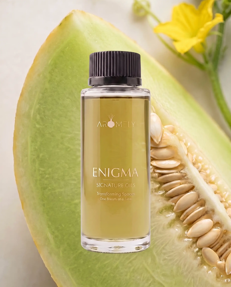 Aromely Enigma fragrance oil bottle, 150 ml, against green melon