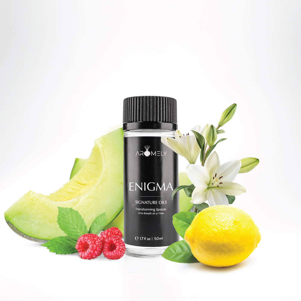 Aromely Enigma diffuser oil, 50ml, featuring honeydew melon, raspberries, lemon, and white lilies. A fruity, citrusy, and floral blend for a mysterious, fresh scent.