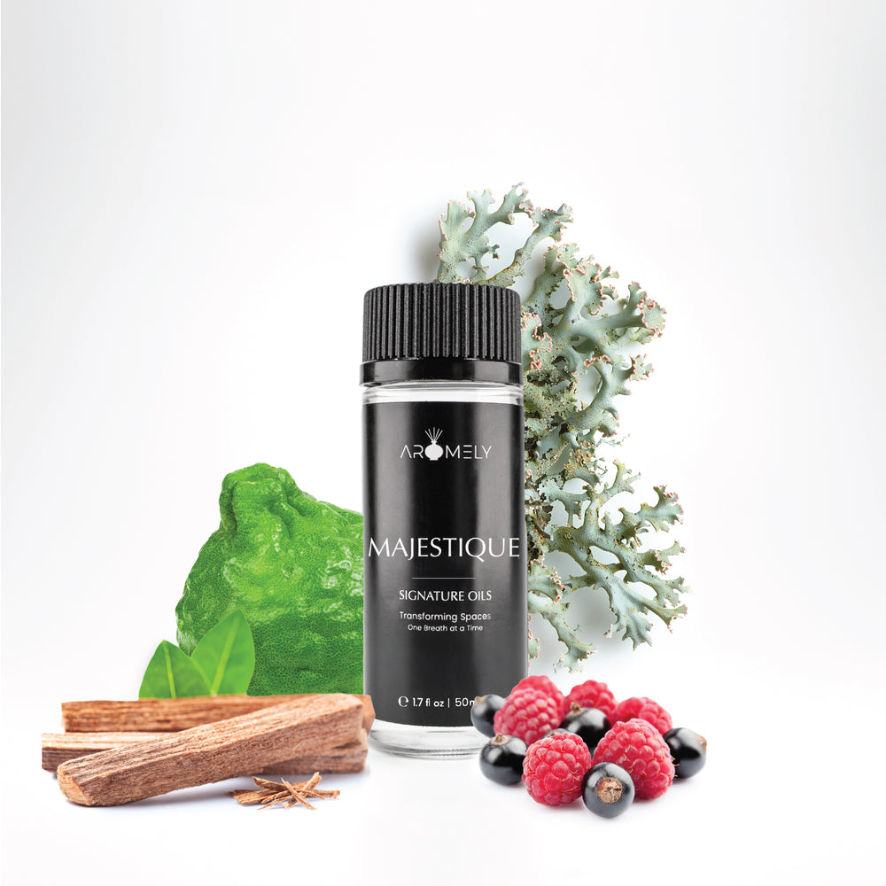 Aromely Majestque diffuser oil, 50ml, featuring bergamot, sandalwood, oakmoss, and mixed berries. A rich, earthy, and slightly fruity scent for a sophisticated ambiance.