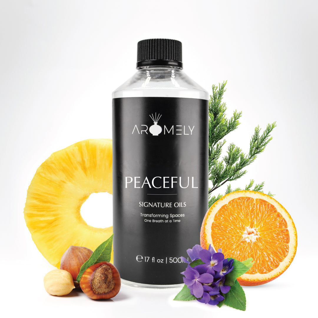 Aromely Peaceful diffuser oil, 500ml bottle, featuring tropical pineapple, orange, violet flowers, and hazelnuts. A fruity, floral, and nutty scent that creates a comforting ambiance, as if you're unwinding at an upscale retreat.