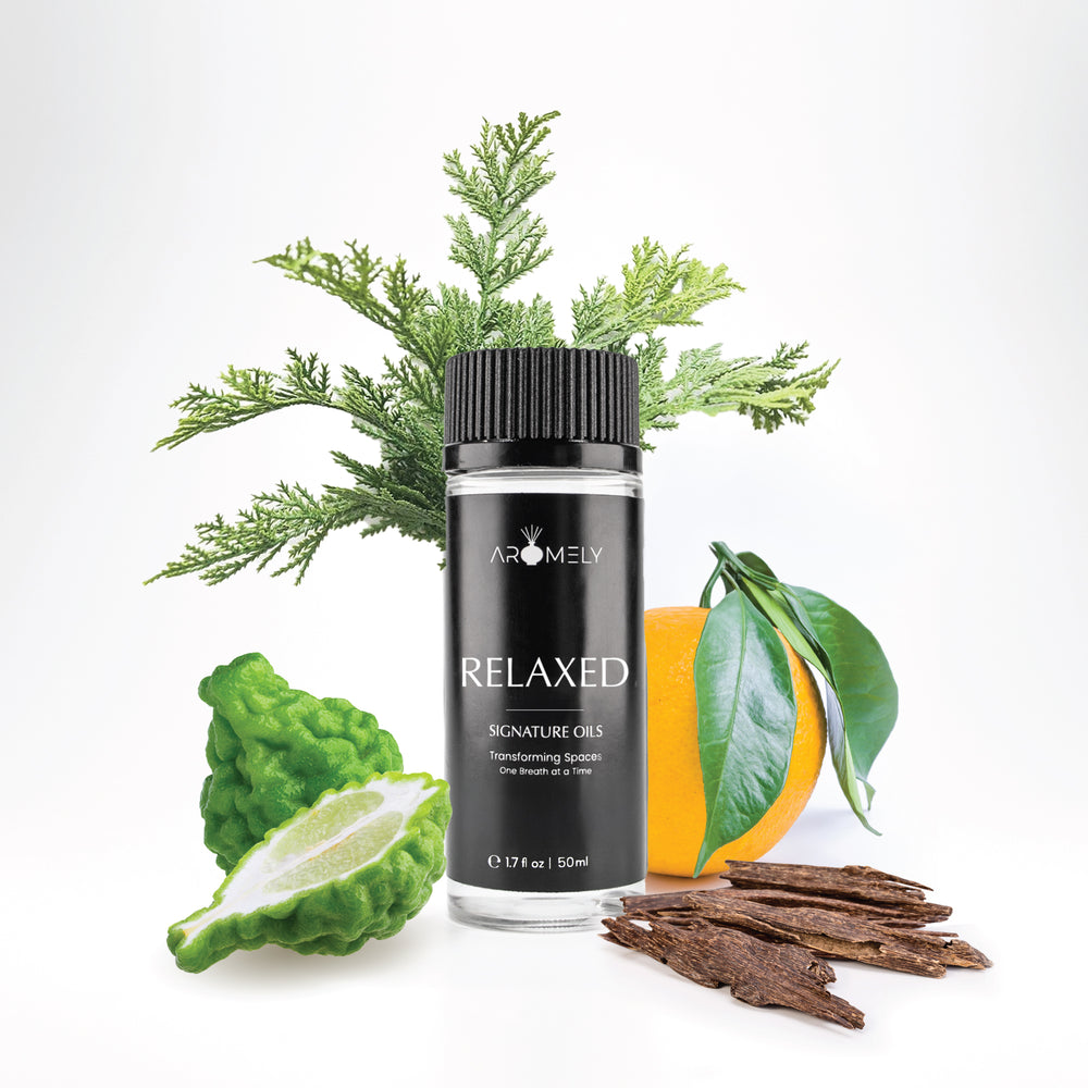 Aromely Relaxed diffuser oil, 50ml black bottle, blended with bergamot, orange, oud wood, and cypress. A soothing, citrus-wood aroma designed for stress relief and relaxation.